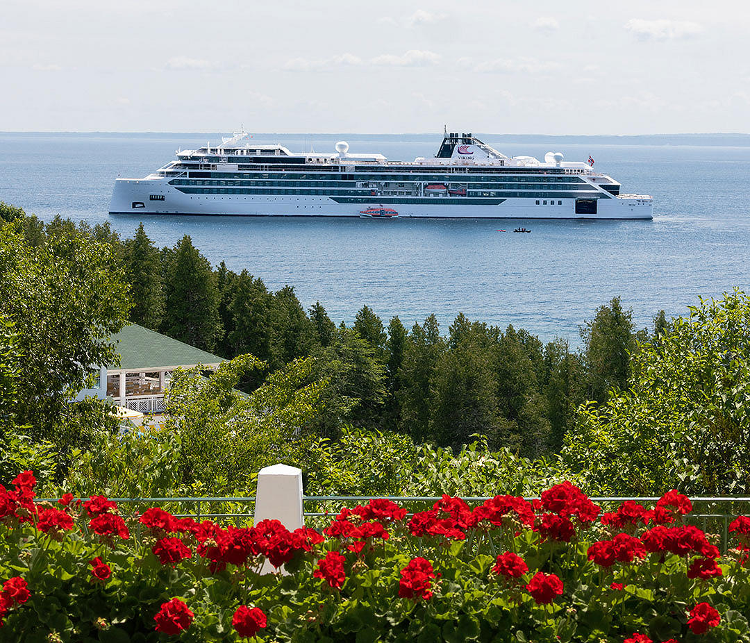 Viking Cruise ship near a bed of flowers