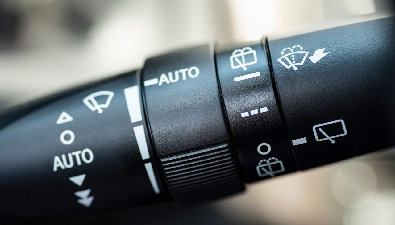 detail of a wiper lever of a car