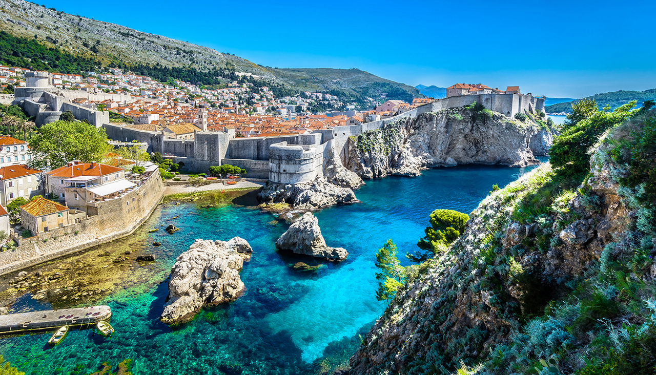 Aerial panoramic view at famous european travel destination, Dubrovnik cityscape on Adriatic Coast, Croatia.