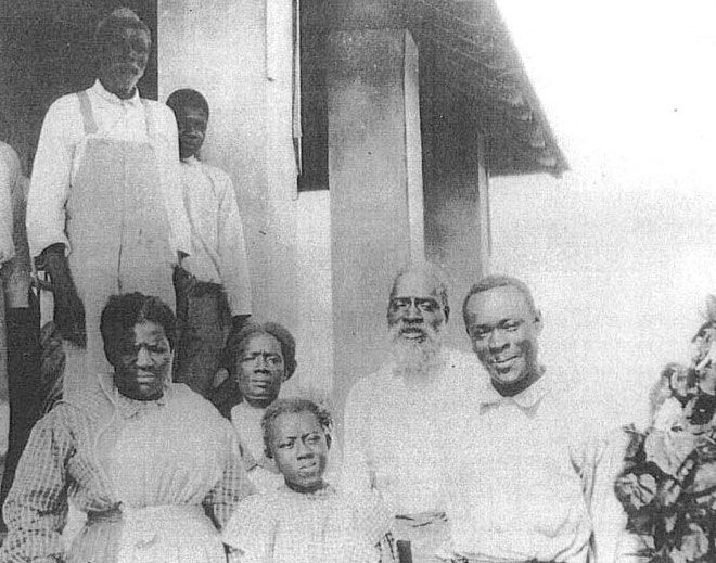 Israel Jones and his family in front of their home on Porgy Key, which later became Biscayne National Park. 