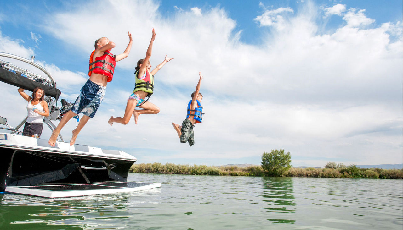 Summer Boating, kids jumping off boat