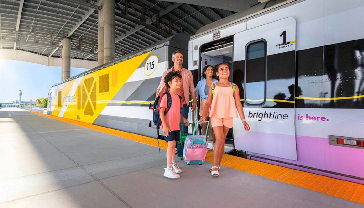 Passengers exiting a brightline train