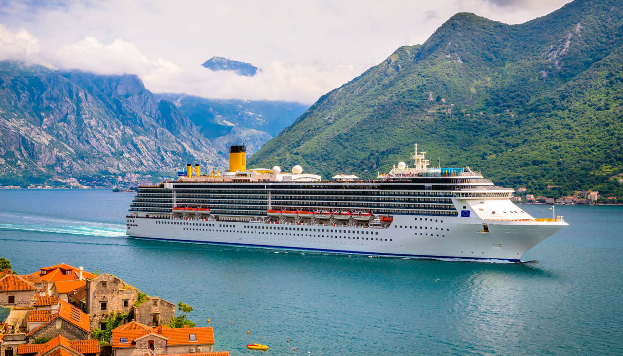 Beautiful mediterranean landscape. Cruise ship near town Perast, Kotor bay (Boka Kotorska), Montenegro. 