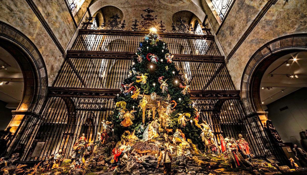 The tree in The Cloisters at The Metropolitan Museum of Art features more than two hundred eighteenth-century Neapolitan crèche figures