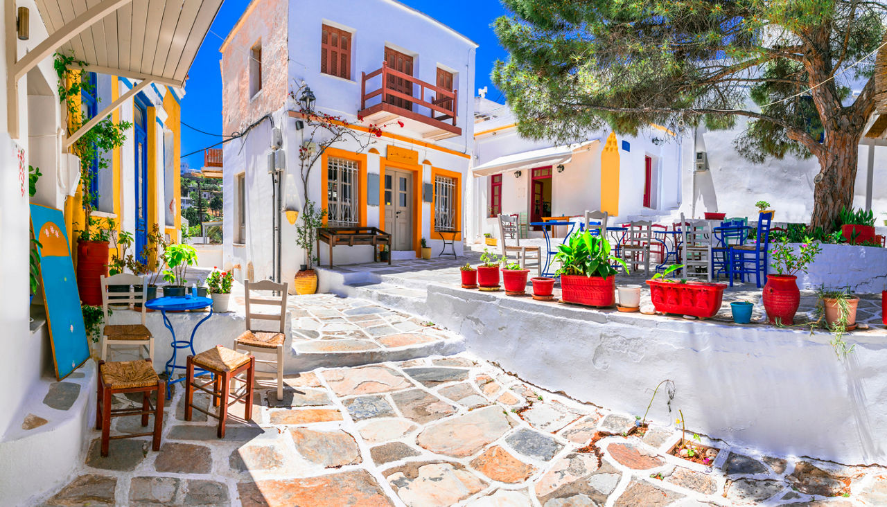 Beautiful Lefkes traditional greek village in Paros island. Charming coffe bars and taverns in colorful narrow streets