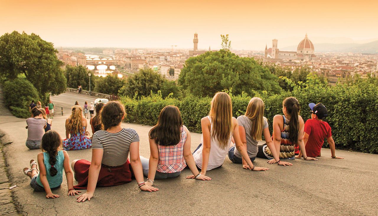 Group of people watching sunset in Florence, Italy
