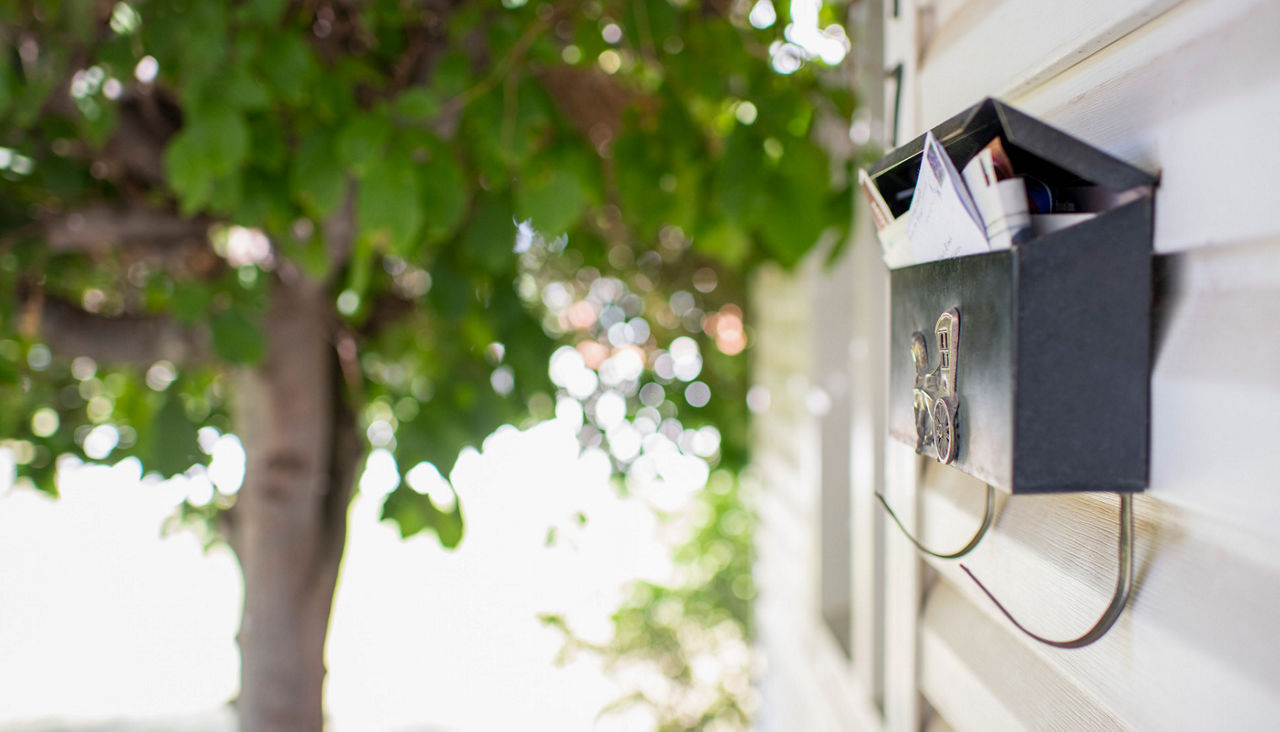 Residential mailbox containing letters