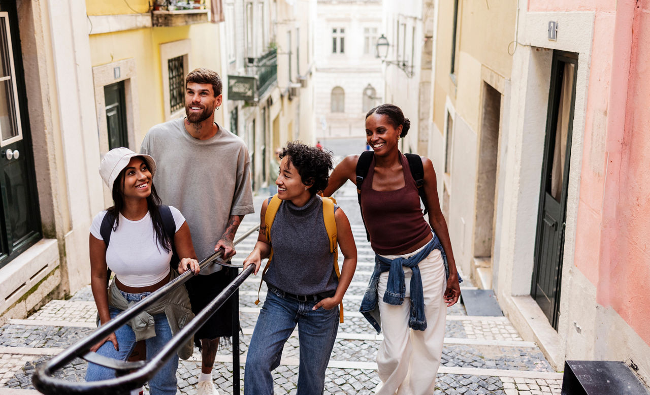 Group of tourists walking down stairs in lisbon, portugal