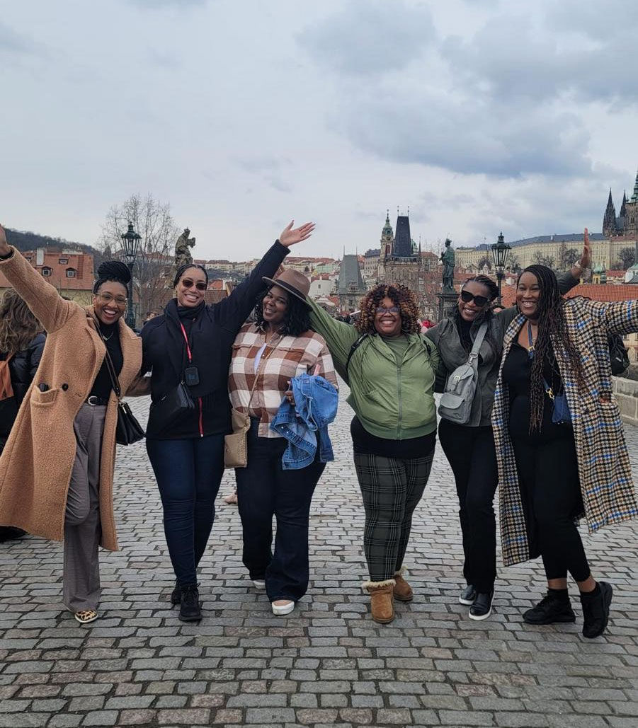 Jasmin and travel group on the Charles Bridge in Prague