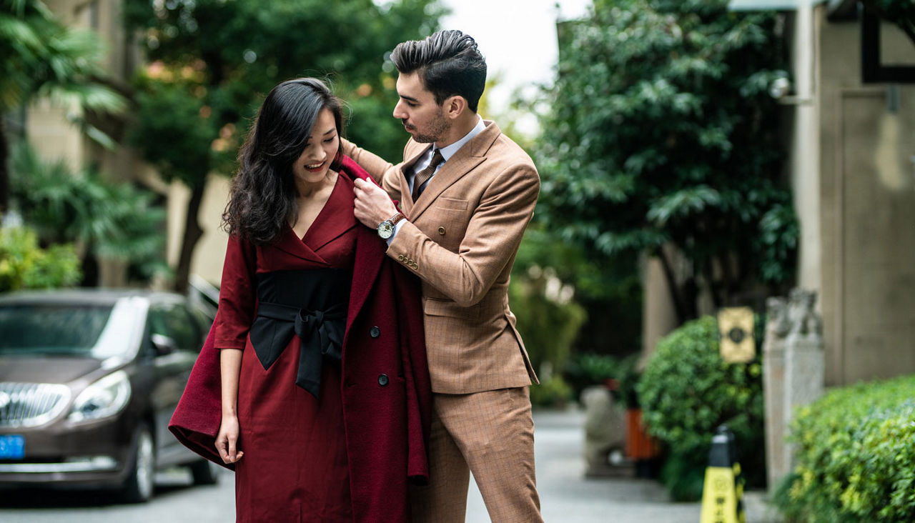 Couple getting dressed up for broadway