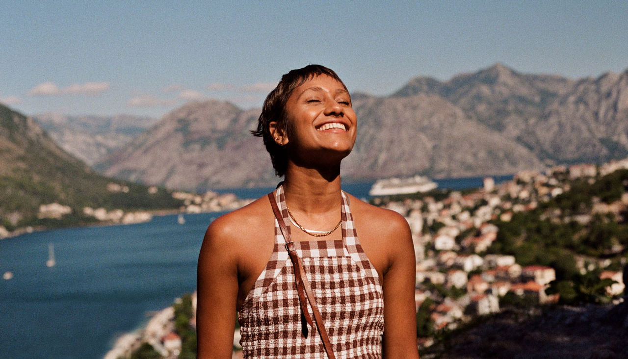 Woman soaking up the sun while on vacation.