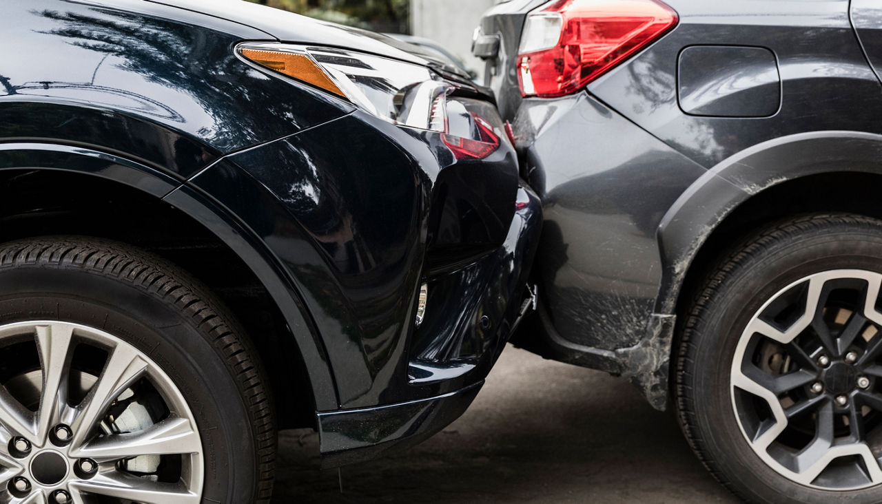 Damaged bumpers from car accident
