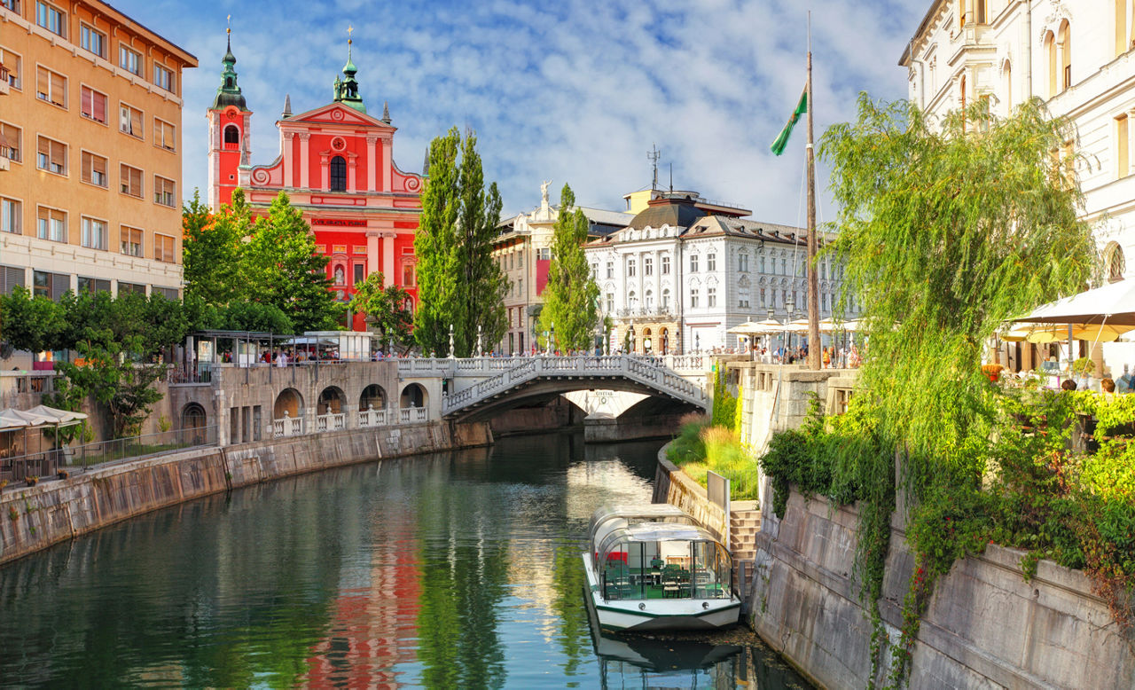 a - Slovenia (Church and river Ljubljanica) 