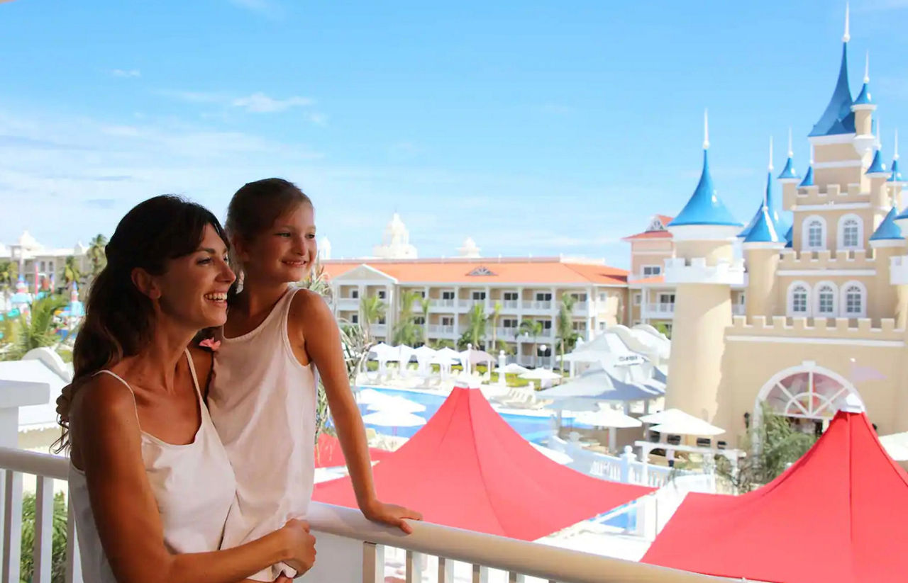 Mother holding daughter at Bahia Principe Fantasia Punta Cana 