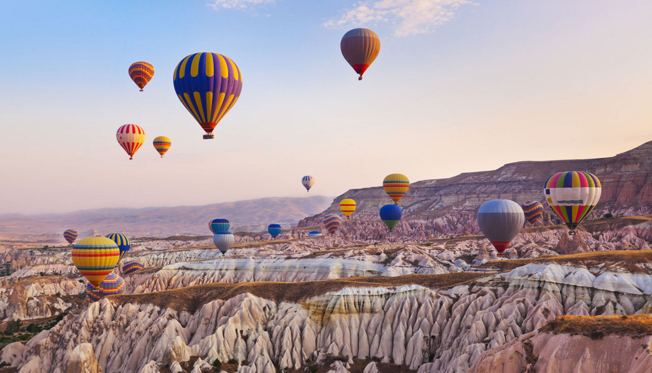 Hot air balloon flying over Cappadocia Turkey