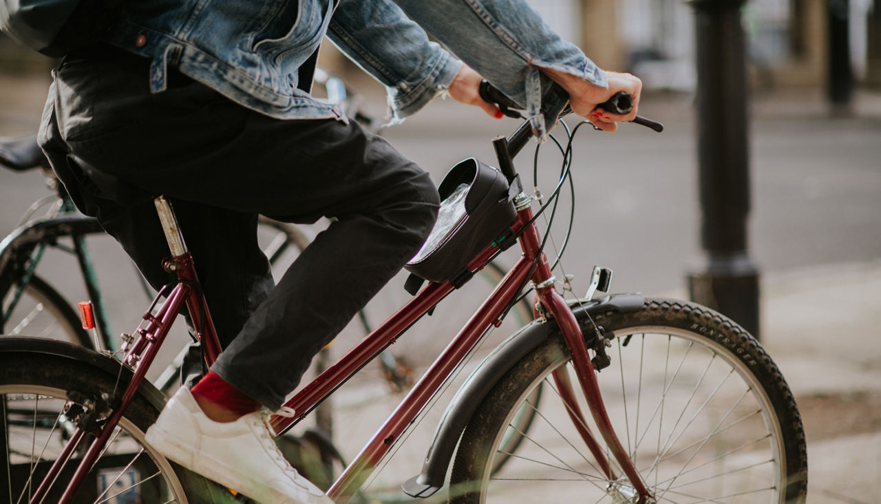 Close up of a man riding a bike
