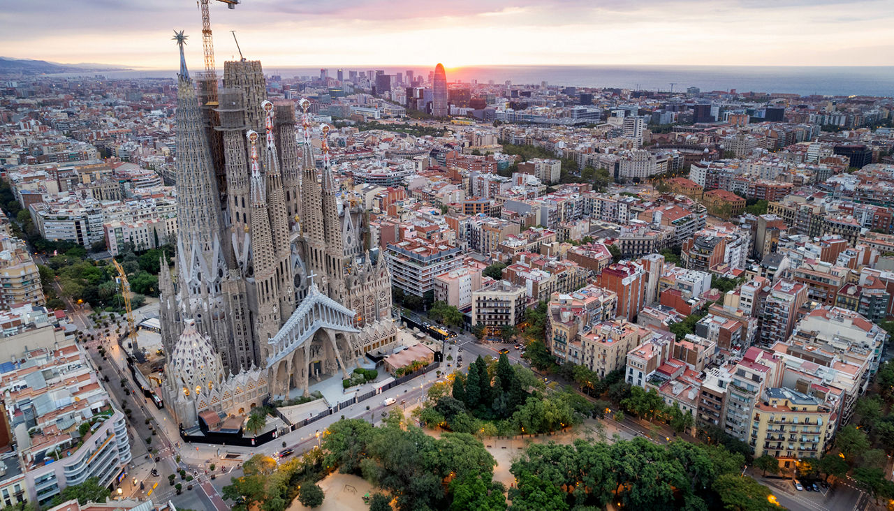 Sunrise drone aerial of the Basilica Sagrada Familia in Barcelona, Spain