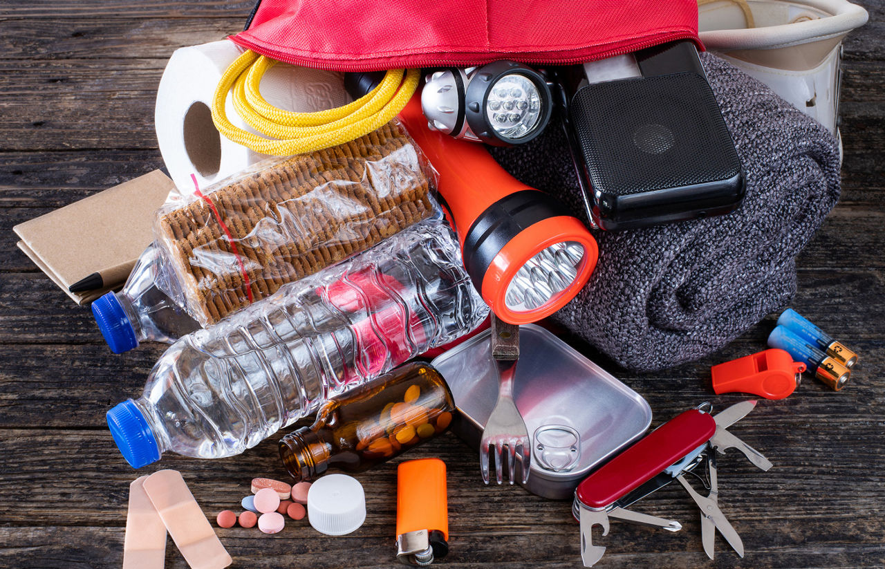 Storm prep essentials like flashlight, blanket, water, medications, batteries and more