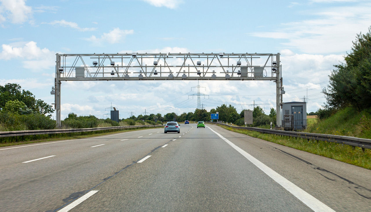 Over the road toll-by-plate 