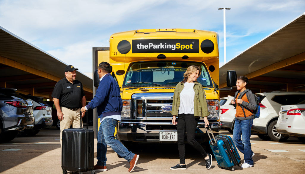 Family traveling and getting on the parking spot van