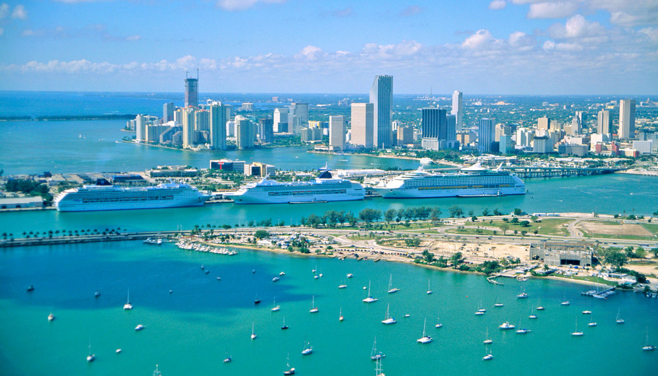 Cruise Ships in Port of Miami with city in background