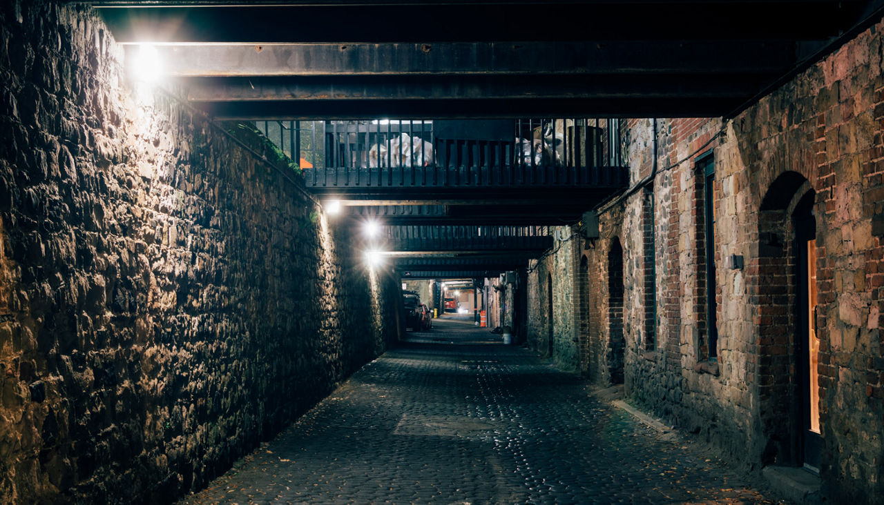 Dark alley at night in Savannah, Georgia