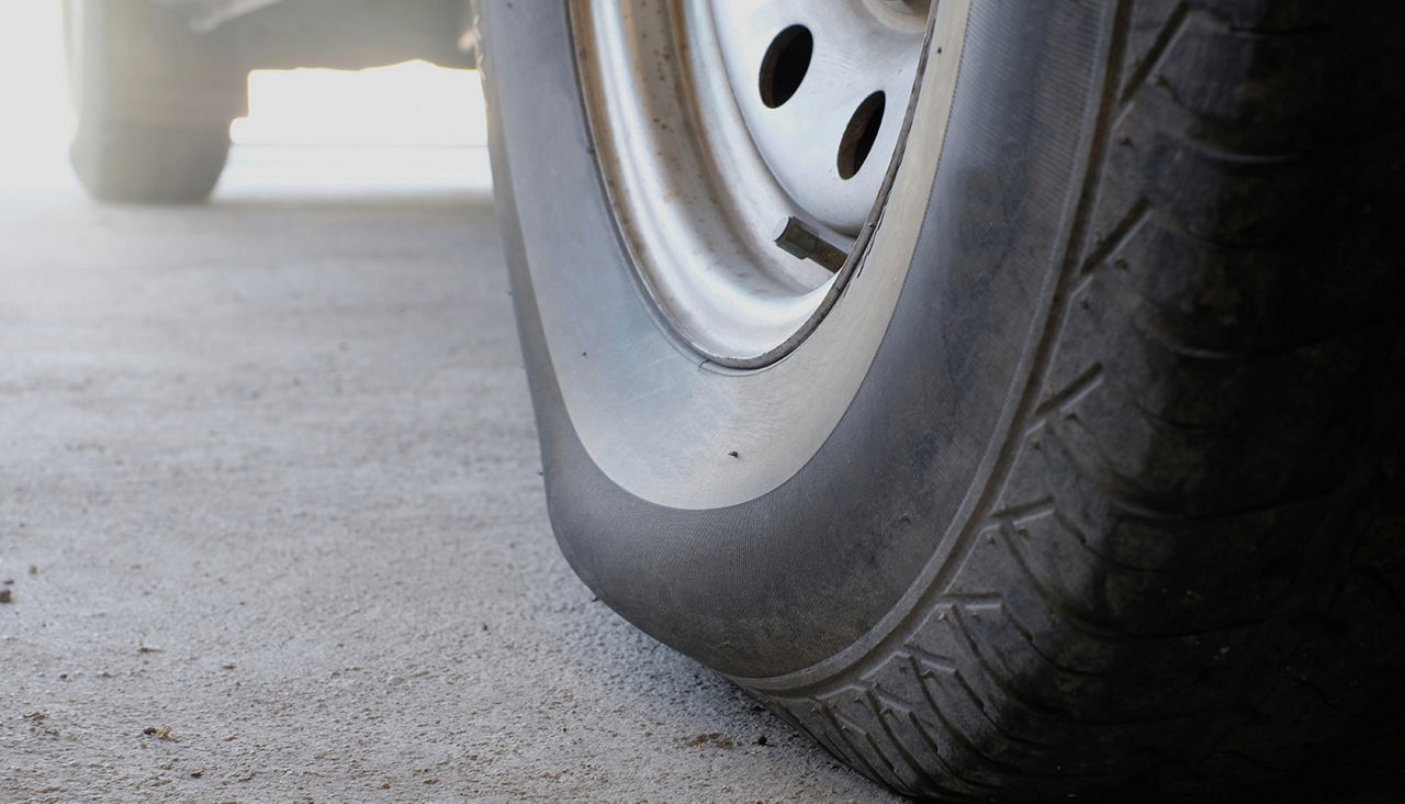 Closeup of bubble swelling on side of tire