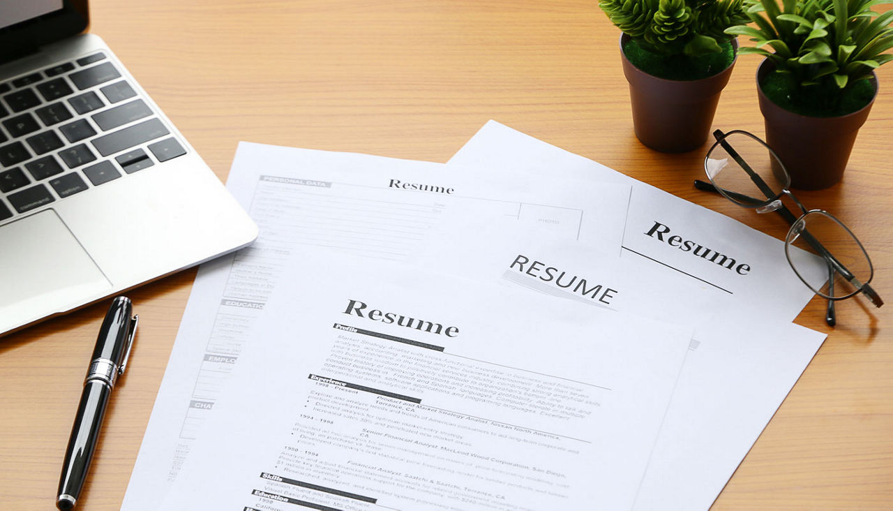 resume on table Office Business