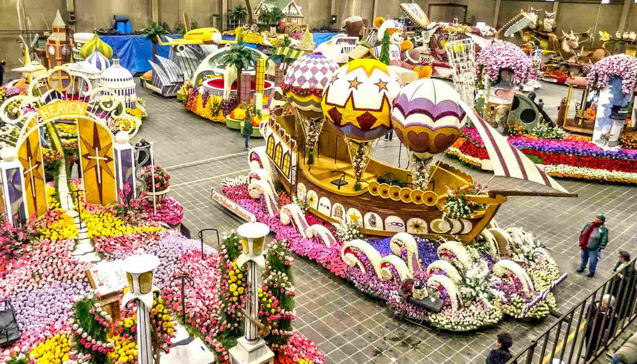 Rose Parade floats inside building