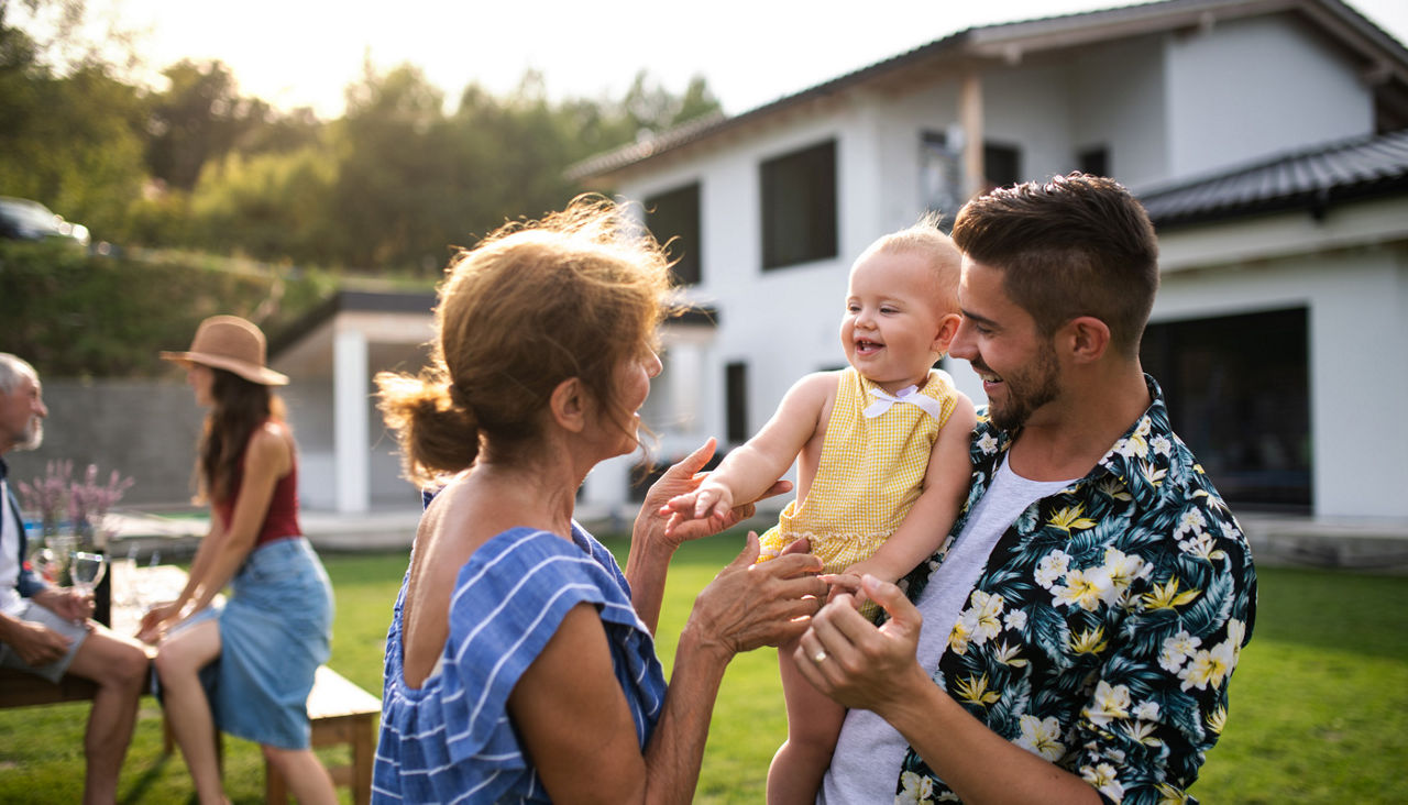 Portrait of multigeneration family in backyard