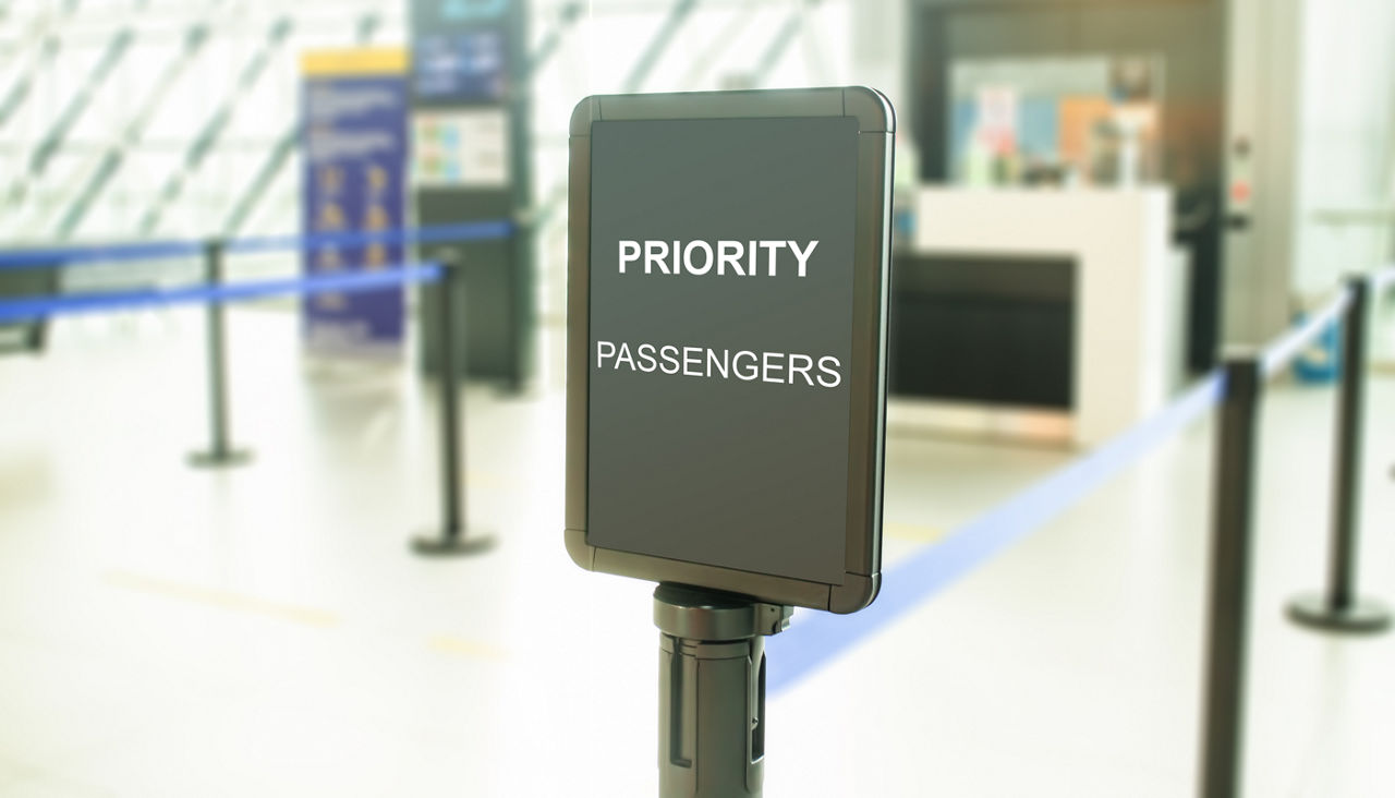 A priority passengers sign in an airport