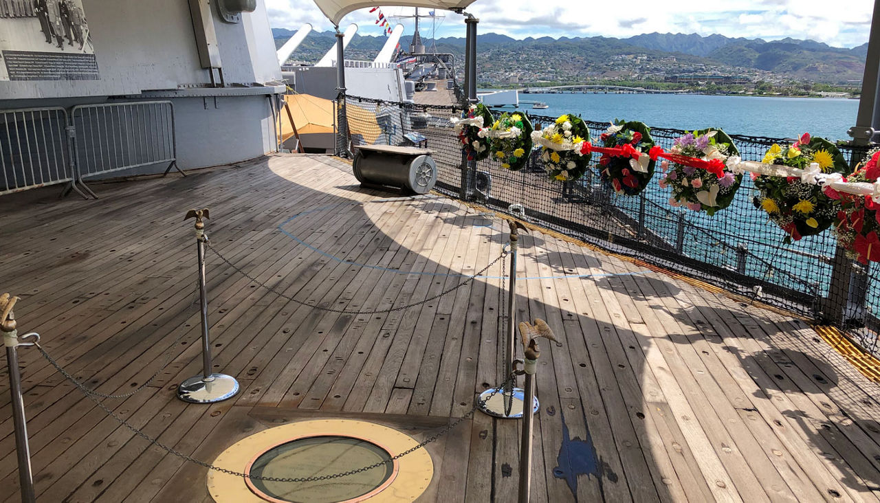 The surrender site aboard the USS Missouri is immortalized with a covered plaque