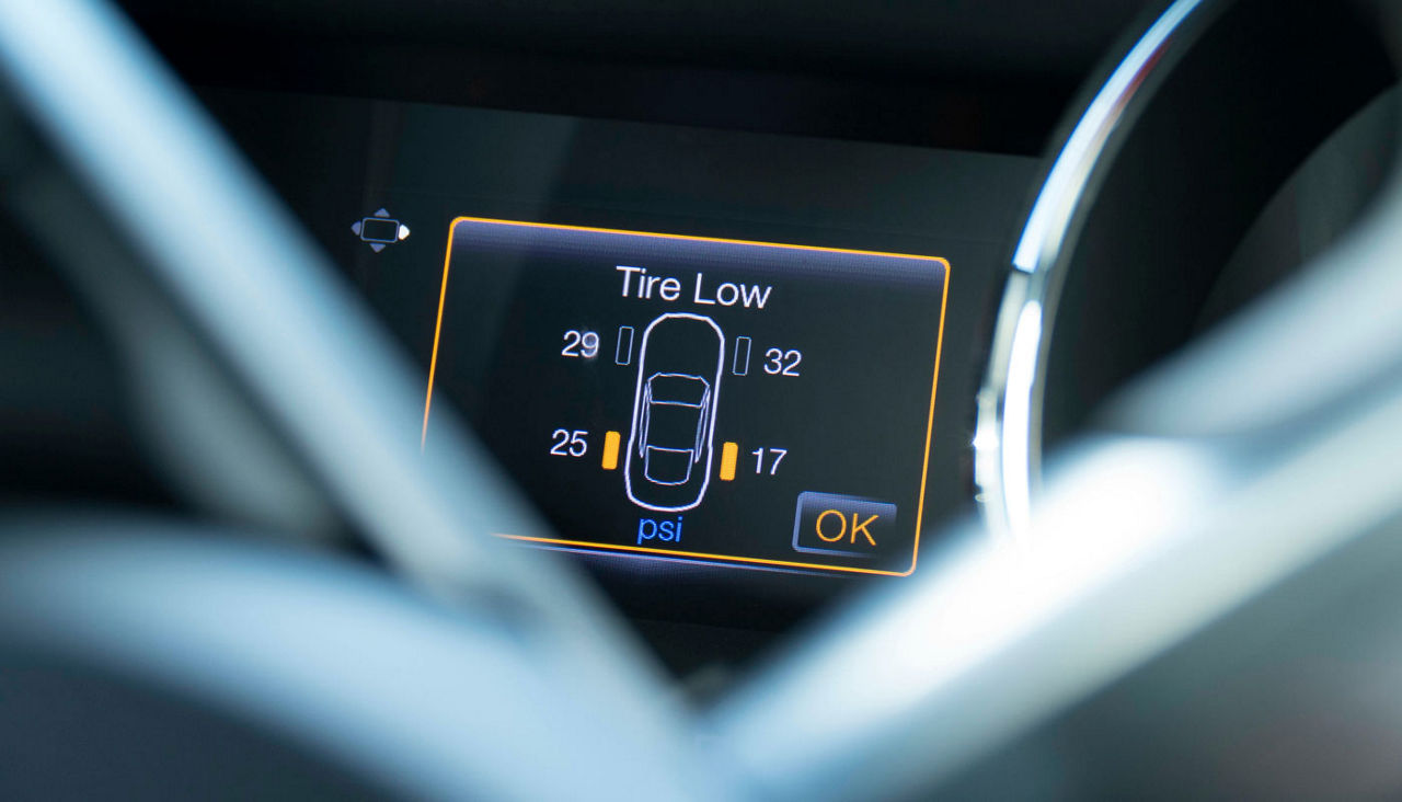 Vehicle tire indicator, indicates tires has low pressure.