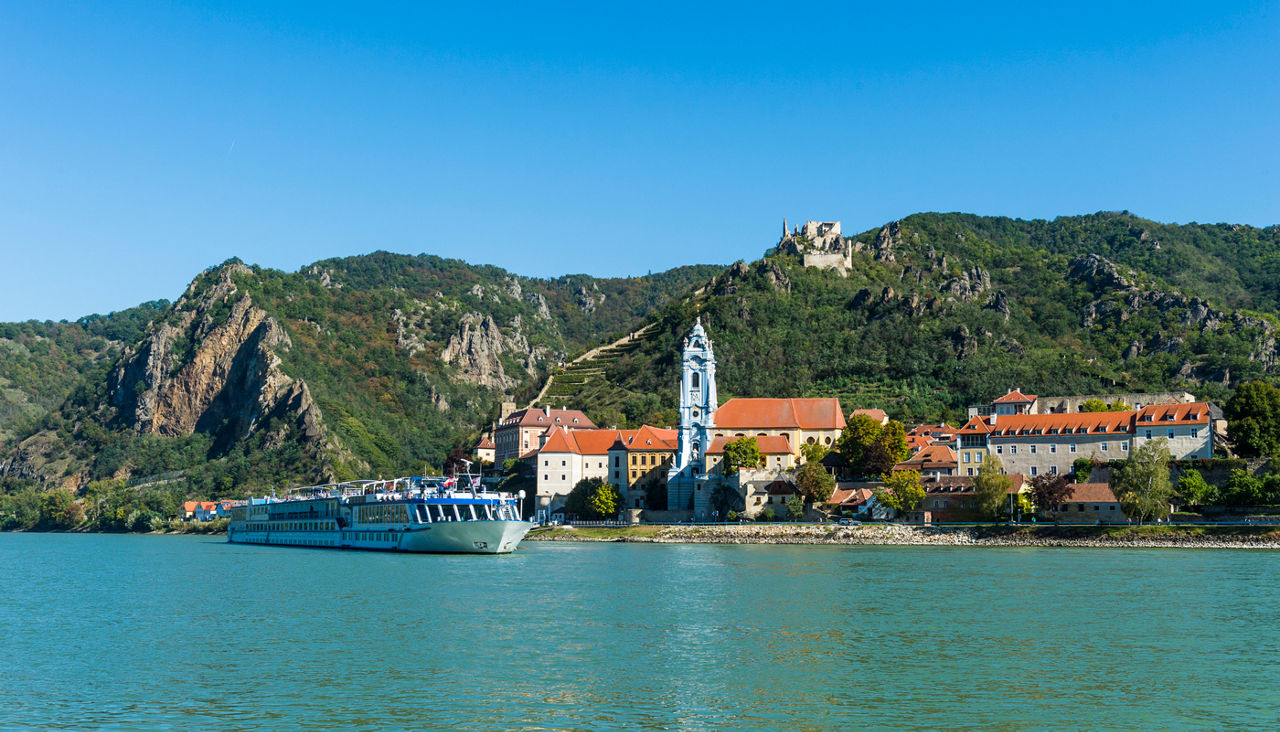 Austria, Wachau, Cruise ship passing Duernstein on the Danube