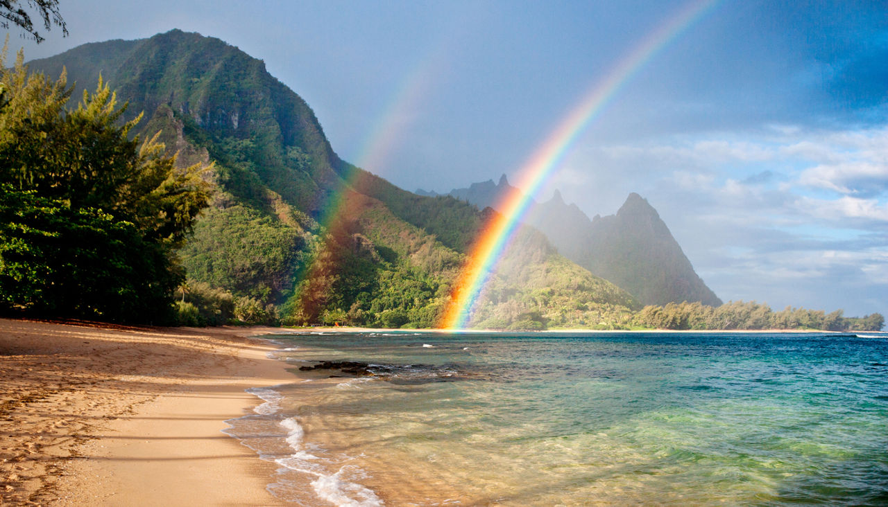 rainbow over one of the Hawaiian island
