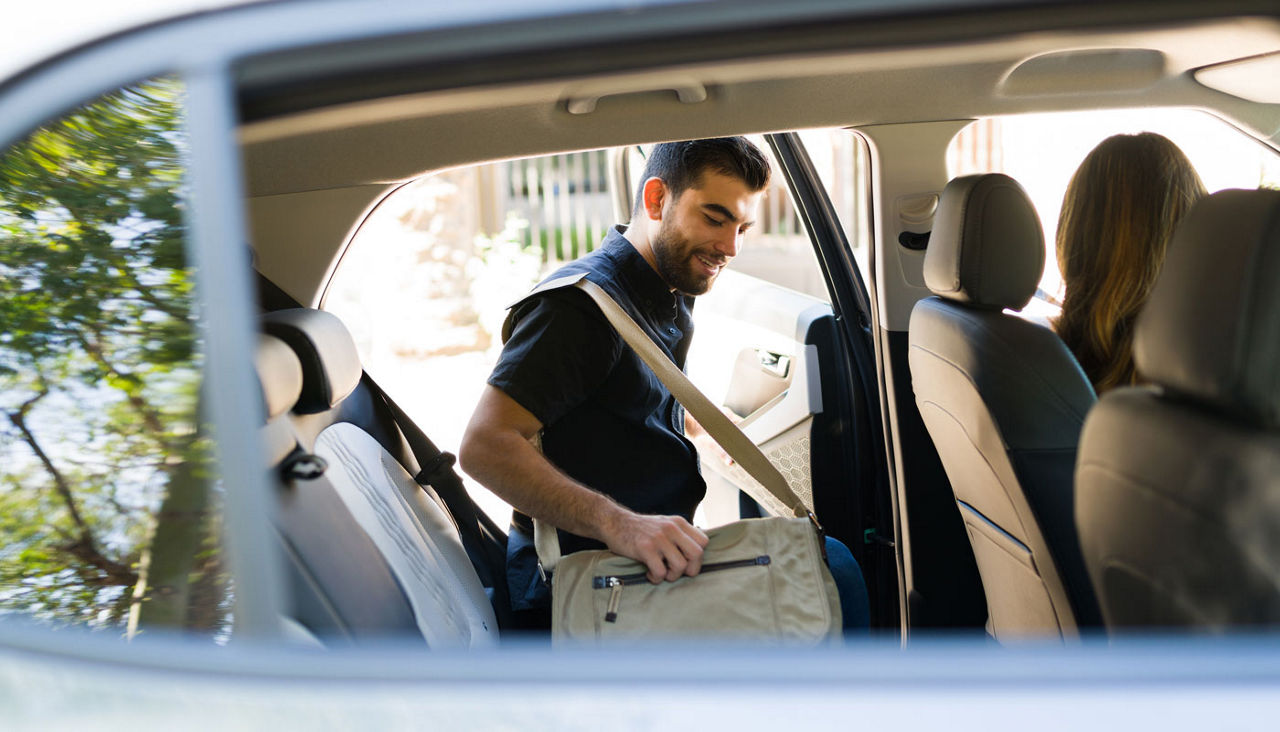 Share ride driver picking up a passenger