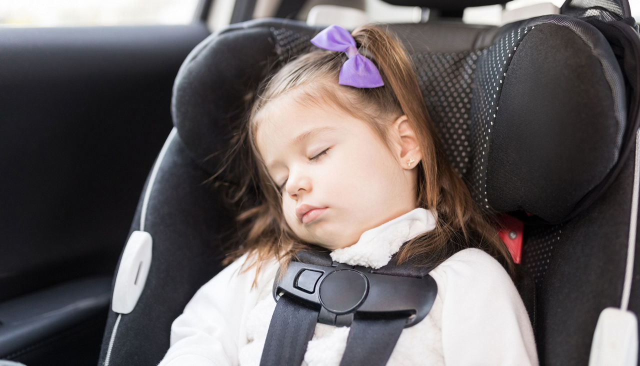 Infant Sleeping In back seat area of Car