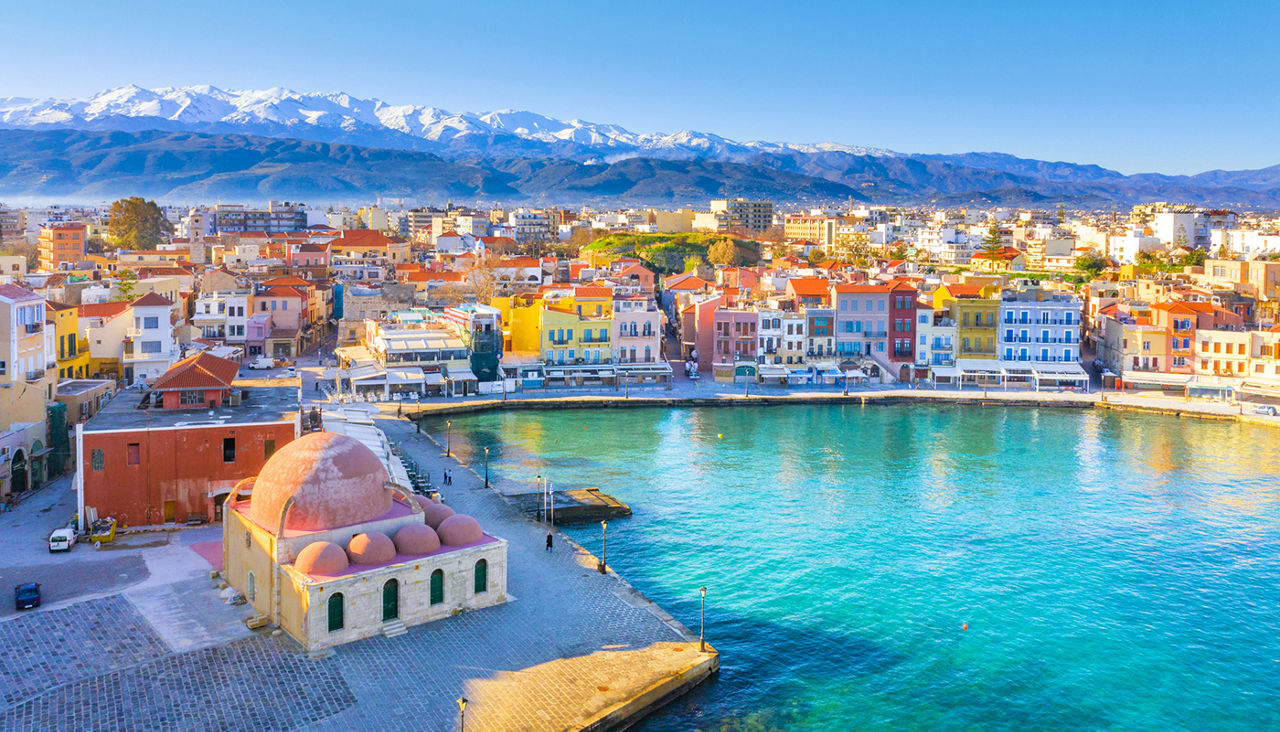 Aerial view of Chania with the amazing lighthouse, mosque, venetian shipyards, Crete, Greece.