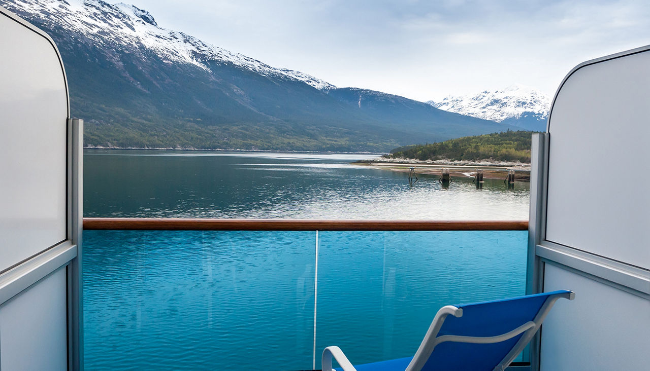 View of Yakutania Point and Smugglers Cove from the balcony of a cruise ship in Skagway, Alaska