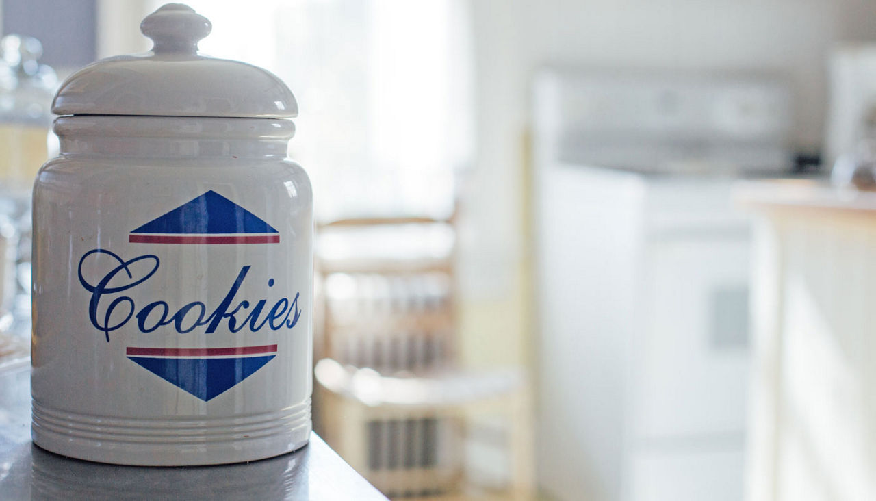 White cookie jar on kitchen counter