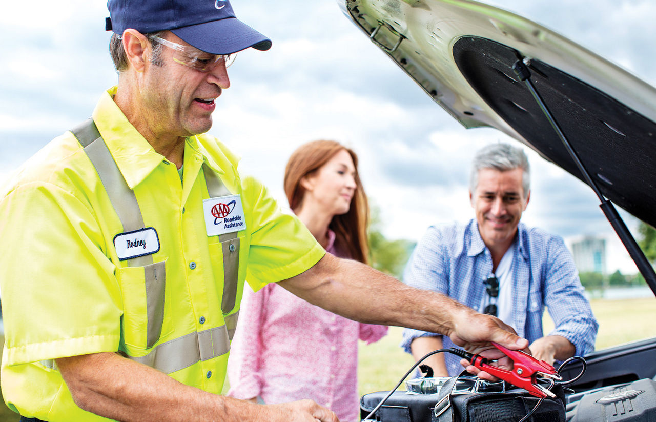 AAA Roadside Assistance providing a battery jump