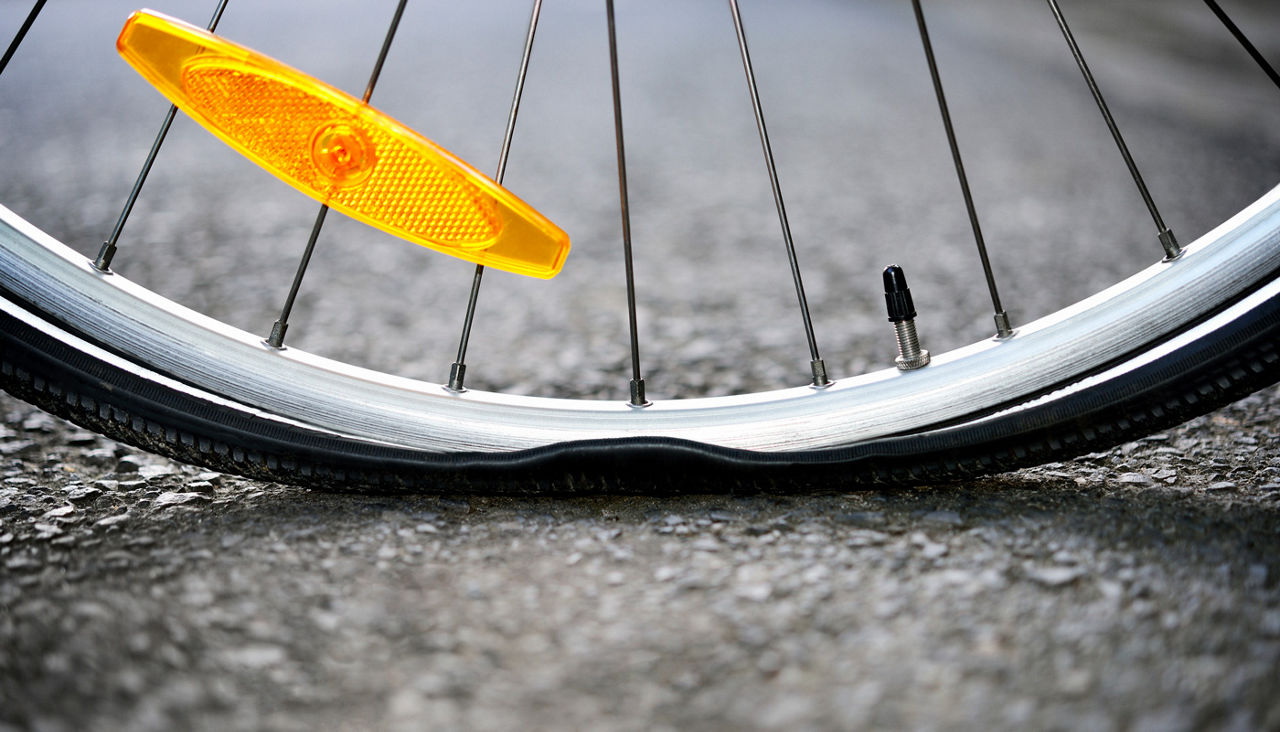 Closeup of punctured bicycle tire