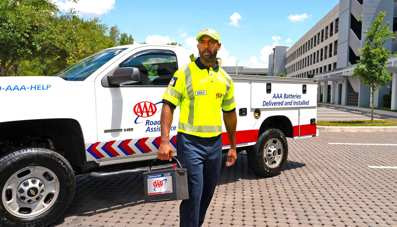 AAA Roadside tech delivering batteries