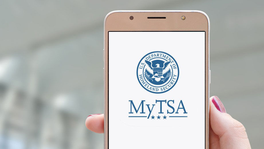 Hand holding smart phone with MyTSA app loaded on screen