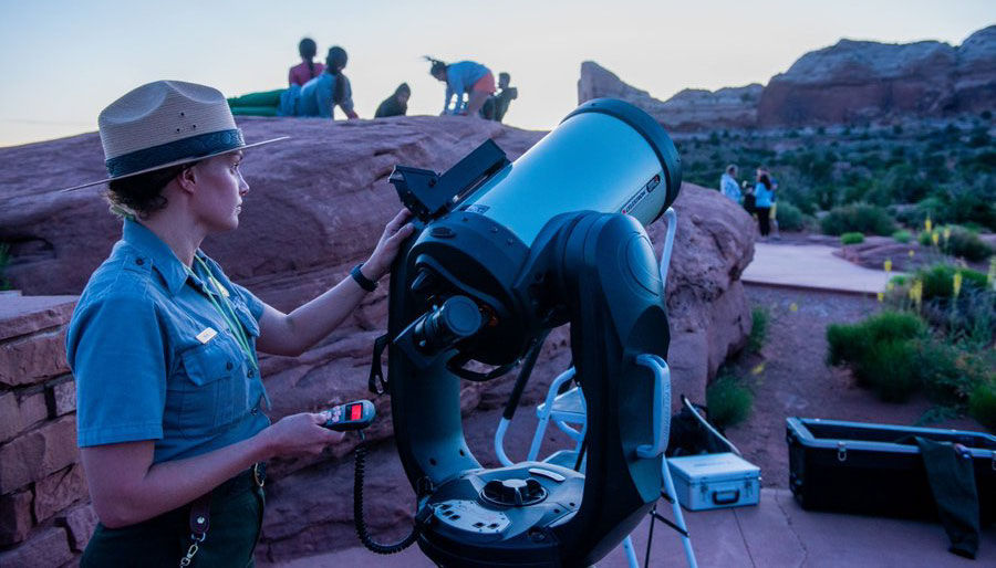 Park ranger with a telescope for star gazing in Great Basin National Park