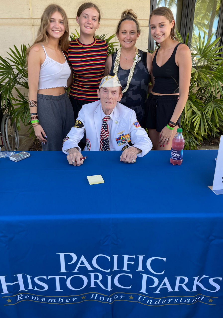 AAA employee, Misty Sutton and her daughters Marlee, Chelsey and McKena with Jack Holder