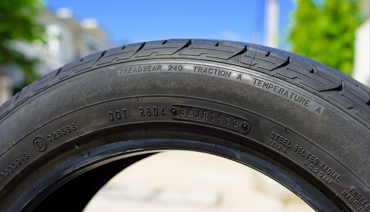 Close up of tire wall showing numbers and information