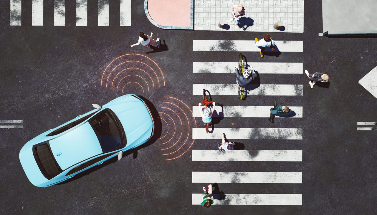 A car moving into a cross walk but showing how technology is indicating to the driver where pedestrians are located.