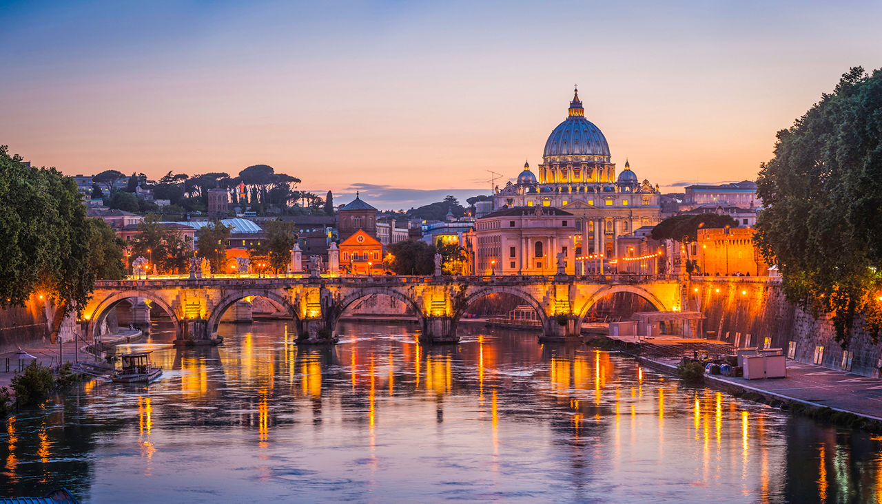 Iconic landmarks of Rome, Italy's ancient capital city, reflecting in the tranquil waters of the River Tiber. ProPhoto RGB profile for maximum color fidelity and gamut.