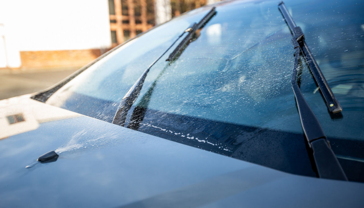Close up of a car windshield washers
